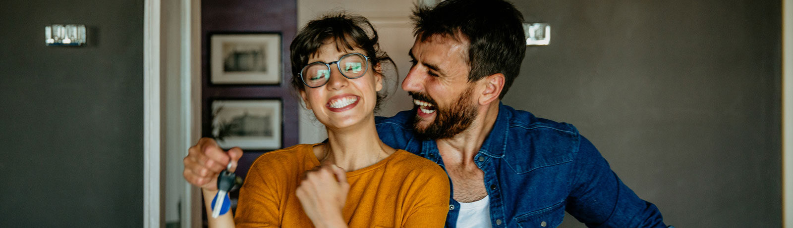 Young couple moving into new house