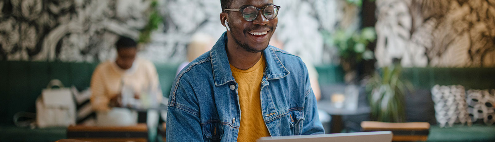 Young man having a meeting on laptop